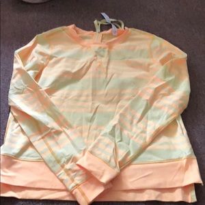 Lululemon size 6 yellow pullover with back zip